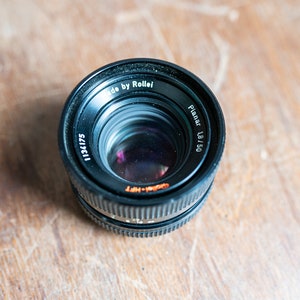 Black Rollei Planar 50mm f1.8 Lens for Parts or Repair