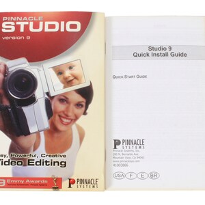 May include: A book cover for Pinnacle Studio version 9 software. The cover features a woman holding a camcorder and a baby in the viewfinder. The text on the cover reads "Pinnacle Studio version 9" and "Easy, Powerful, Creative Video Editing". The cover also includes a logo for Pinnacle Systems and a statement that the software has won 9 Emmy Awards.