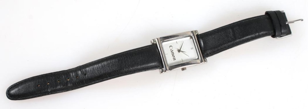 Canon Camera Silver Watch W/ Black Bands and Water Resistant