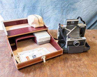 Kit de cámara Polaroid 340 Land con estuche y accesorios - TAL CUAL