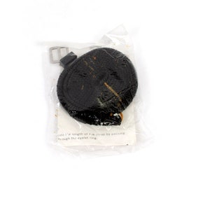 May include: A black leather camera strap with a silver buckle. The strap is rolled up and packaged in a clear plastic bag. The text on the bag reads: "Adjust the length of the strap by passing it through the eyelet ring."