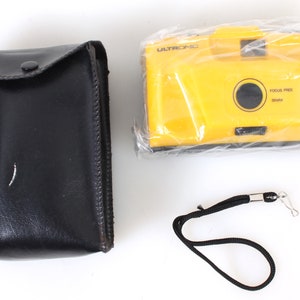 35mm Yellow Camera w/ Case and Wrist Strap