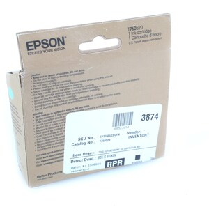 May include: A cardboard box of Epson ink cartridge. The box has the Epson logo and the text "EXCEED YOUR VISION". The label reads "1 Ink cartridge" and "1 Cartouche d'encre". The box also has a white label with a barcode and the number "3874".