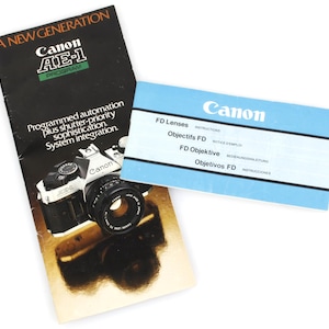 Canon AE-1 programbok och instruktioner för FD-objektiv