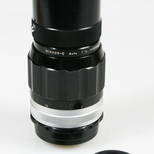 Nikon NIKKOR-Q 200mm F 4.0 Manual Focus NON AI Telephoto Lens W/ Front & Rear Caps