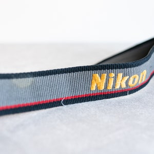 Nikon Vintage Strap - Grey / Black w/ Red Pin Stripe