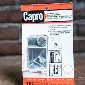 Capro Camera Clip for 110 Film Cameras - New Old Stock
