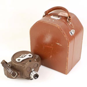Kamera filmowa Art Deco Bell & Howell Filmo 70 16 mm z etui