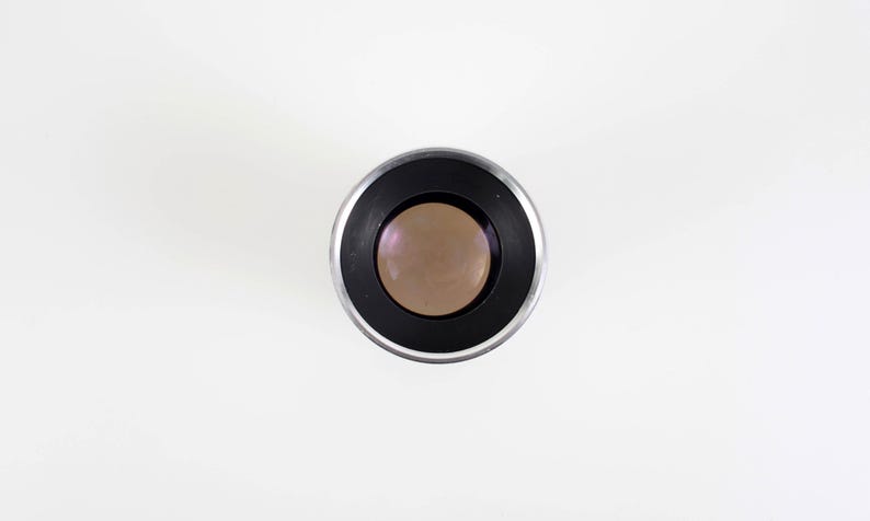 May include: A set of three ceramic mugs with a speckled, matte finish. The mugs are in shades of cream, light gray, and dark gray. Each mug has a simple, minimalist design, perfect for coffee or tea.