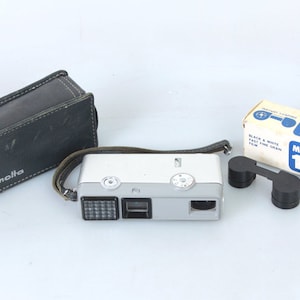 16 mm フィルム スパイカメラ ミノルタ 16 EE ケース + 白黒フィルム + 予備カートリッジ付き