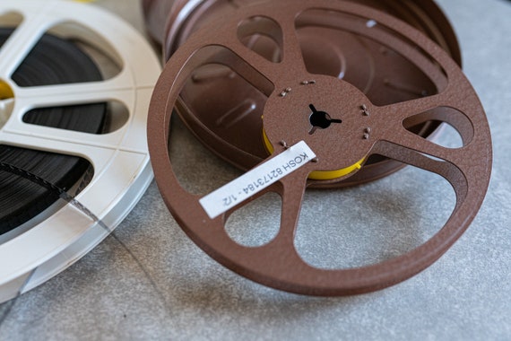 Movie Film Found Footage One 8mm Reel 50% Full One Empty 3/8 Deep Reel 