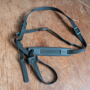 Vintage Black Minolta Camera Strap w/ Shoulder Pad, Cap Keeper