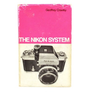 The Nikon System by Geoffrey Crawley F Published Henry Greenwood London 1970