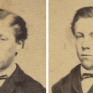 May include: A sepia-toned portrait of a man in a dark suit and bow tie. The image is a vintage photograph, likely from the 19th century, with a slightly faded appearance. The man has short hair and a serious expression.