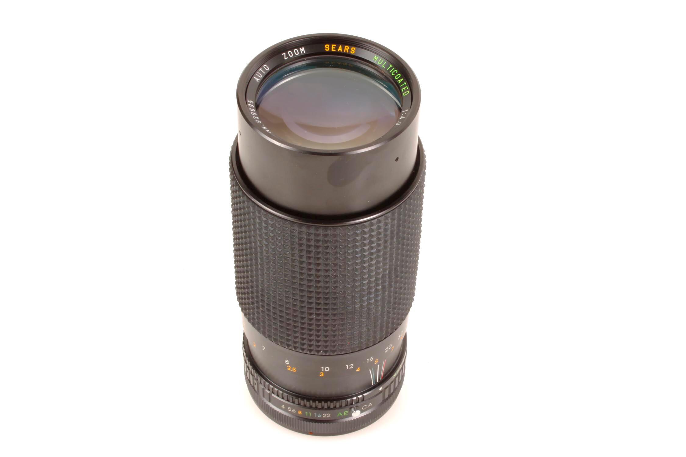 Objectif zoom Canon FD 80-200mm F1:4 + filtre + Boîte de Rangement