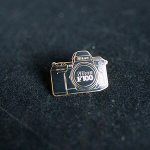 Nikon F-100 Film SLR Camera Lapel Pin Vintage - New Old Stock