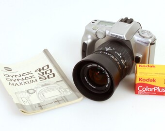購入不可 確認用 35 mm 学生用カメラ、28-90 mm レンズ、フィルム、マニュアル付き