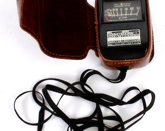 Fotómetro antiguo con estuche de cuero, años 50