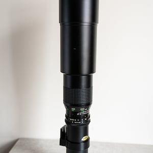 Spiratone 400mm f6.3 T Mount Lens w/ Lens Hood en Minolta MD Adapter