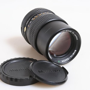 150 mm F 3,5 N Mamiya Sekcor C-lens voor Mamiya 645, met doppen voor en achter
