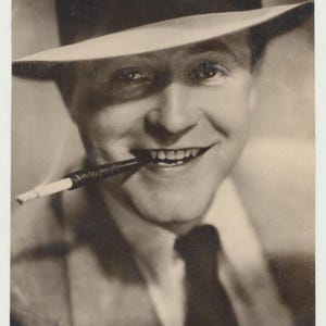 Man in a Classy Hat w/ a Classy Cigarette on a Stem. Photo Postcard.