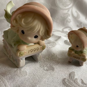 Precious Moments 1999 figurine and ornament