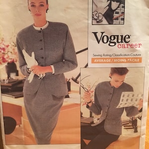 May include: A vintage Vogue Patterns sewing pattern for a women's suit. The pattern is for a black and white checked suit with a jacket and skirt. The pattern is from the Geoffrey Beene career line and is rated as average in difficulty.