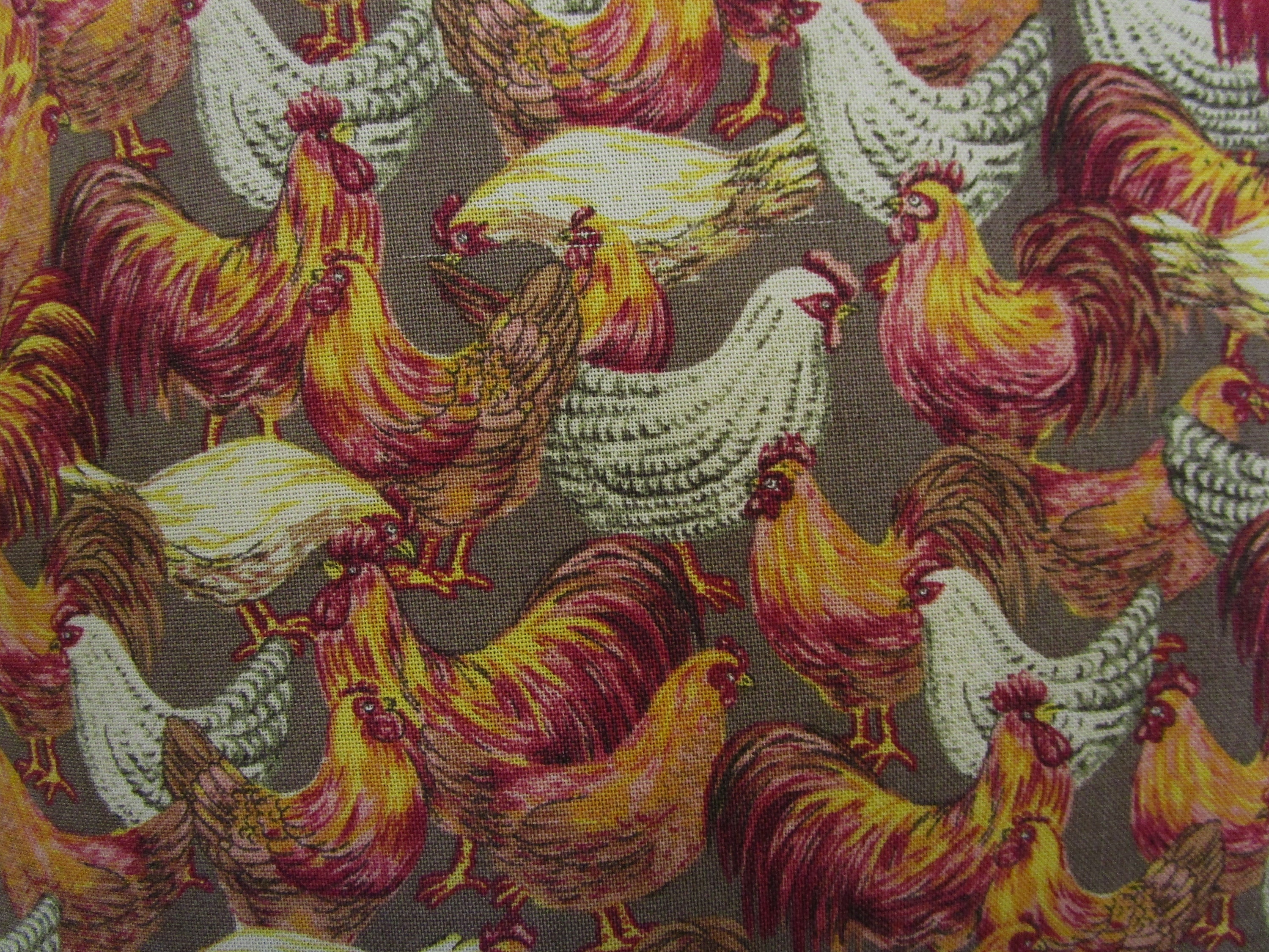 hook and braid round rooster rug by Bob Timberlake