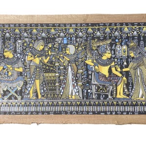 May include: An Egyptian papyrus scroll featuring a detailed illustration of pharaohs and figures in traditional attire. The artwork uses a palette of yellow, blue, and black, with hieroglyphs and decorative borders. The scroll has a textured, aged appearance.