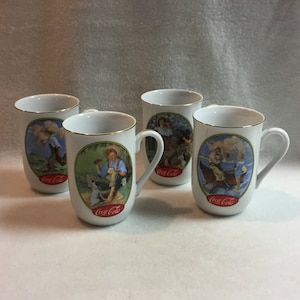 Coca Cola Mugs Featuring Norman Rockwell Art - Set of 4 (#JMS-Mug025)