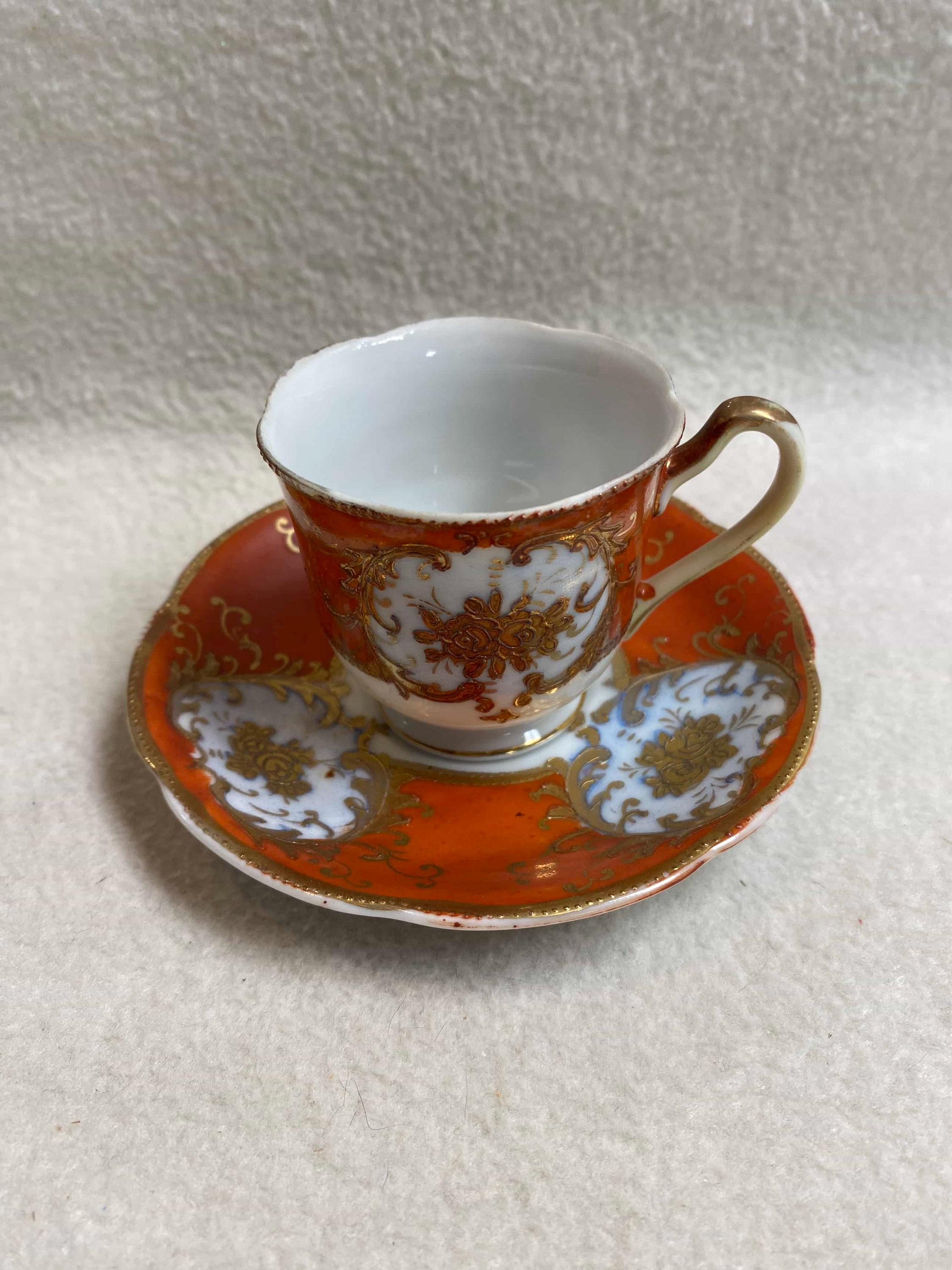 Vintage Small Occupied Japan Cup and Saucer (orange/gold