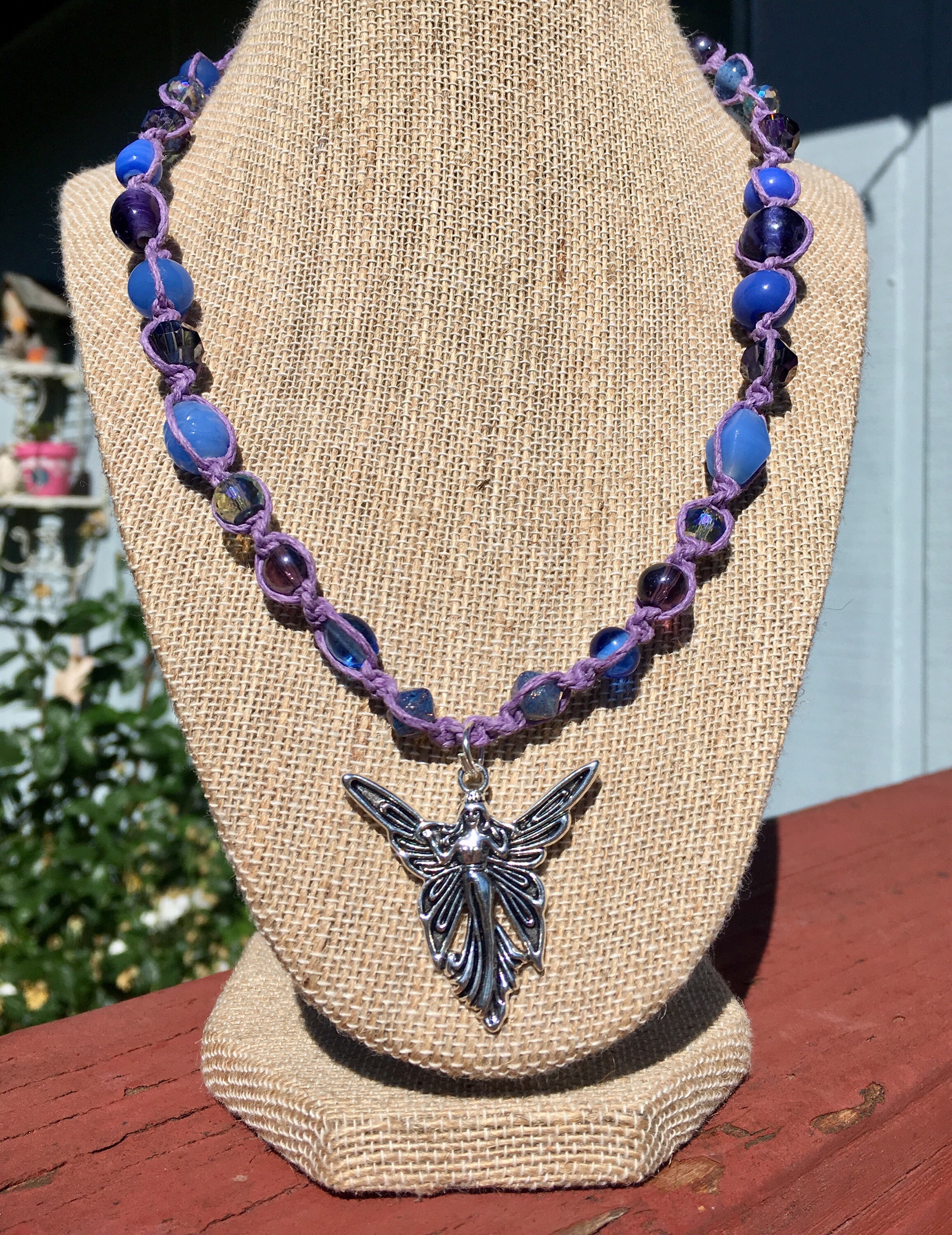 Macrame hemp necklace with amethyst pendant and glass beads