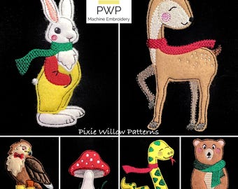 Puede incluir: Un conjunto de seis parches de animales y naturaleza bordados en fieltro. Los parches incluyen un conejo blanco con una bufanda verde, un ciervo marrón con una bufanda roja, un búho marrón con botas amarillas, un hongo rojo y blanco, una serpiente verde con una bufanda roja y un oso marrón con una bufanda verde. Los parches están todos sobre un fondo negro. Pixie Willow Patterns Bordado a Máquina.