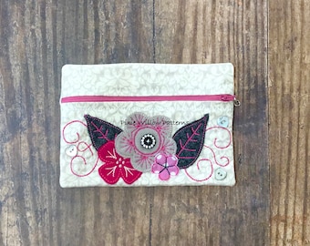 Bolsa con cremallera con aplique de collage floral. Patrón de bordado a máquina ITH.