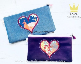 Machine pour sacs à fermeture éclair ITH avec applique coeur. Motif de broderie machine.