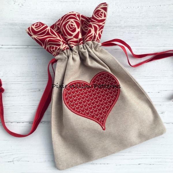 ITH Drawstring Bag with heart applique. In the hoop fully lined, valentines drawstring bag for 5x7, 6x10, 7x11, 8x12 and 9x12 hoops.