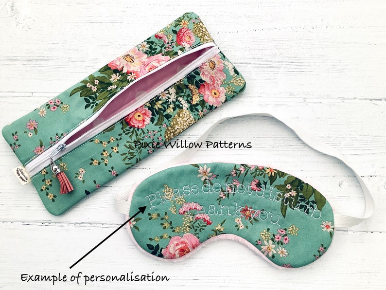 May include: A green floral eye mask with a white elastic strap. The eye mask has the text "Please do not disturb thank you" embroidered on it. An example of personalisation.