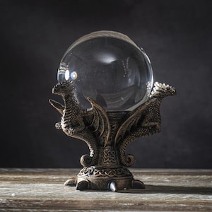 May include: A set of three ceramic mugs with a speckled, matte finish. The mugs are in shades of cream, light gray, and dark gray. Each mug has a simple, minimalist design, perfect for coffee or tea.