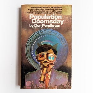 May include: Vintage paperback book cover for "Population Doomsday" by Don Pendleton. The cover features a collage of a person with a gas mask and goggles, set against a backdrop of the Presidential Seal and a cityscape.