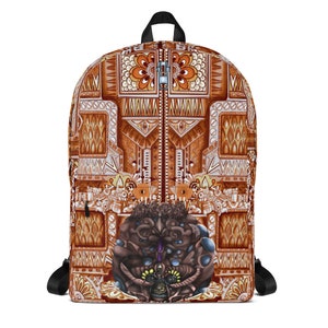 May include: A brown backpack with a geometric pattern and a large, detailed, brown and purple face in the center. The backpack has a zipper closure and adjustable straps.