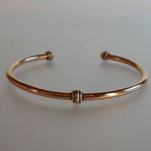adjustable open bangle bracelet in bronze decorated with rings and balls - gift for woman