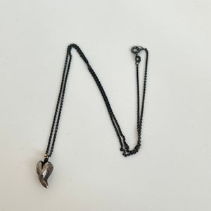 Beautiful Milas Brand unique sterling silver and yellow gold heart pendant created by Danish designers
