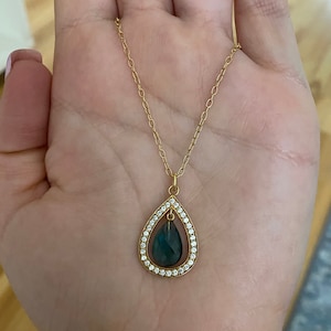 Sterling silver 925 Susanne Fris Bjorner yellow gold plated pendant with white zircon and teardrop blue stone