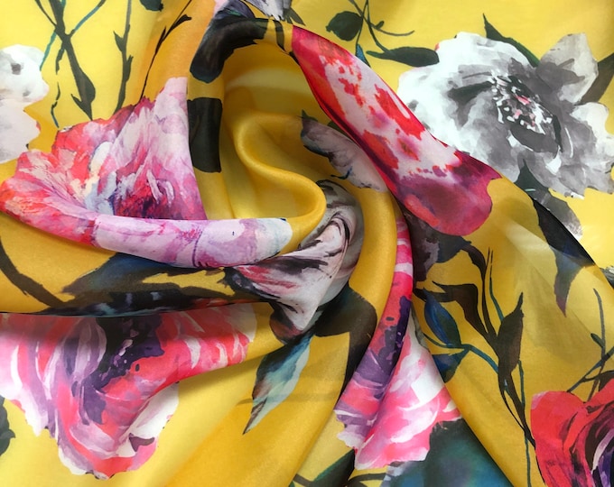 Satin face organza, also called Gazzar 54” wide. Beautiful yellow base with Fusia green mix colors flowers summer design.