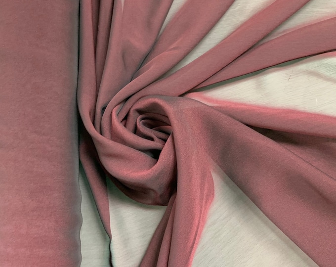 Beautiful Irredescent wine color poly chiffon 44” wide.  Best used for apparel and drapes. Sold by the yard