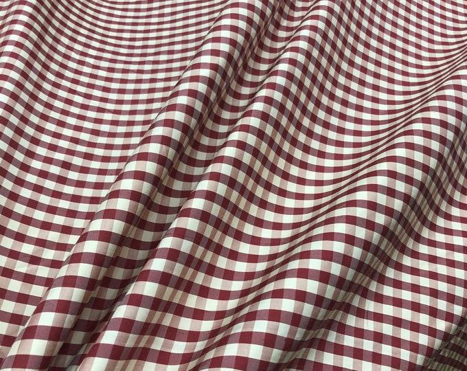 Beautiful wine beige color silk gingham taffeta 54” wide. Best used for apareal and home decor.  Sold by the yard
