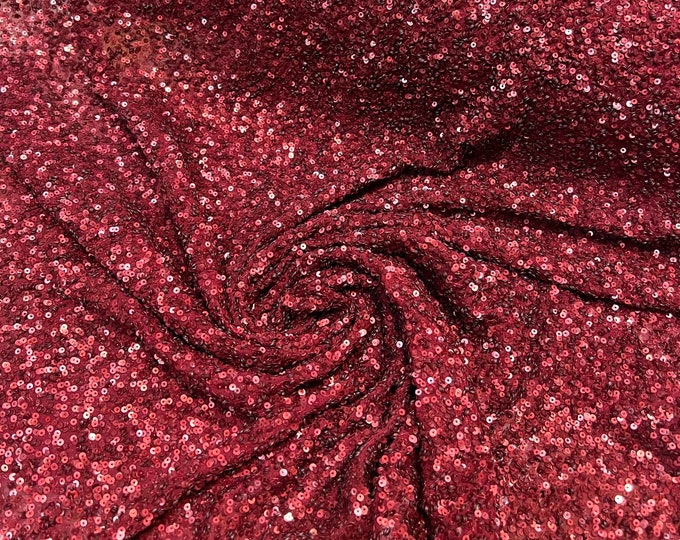 Beautiful Wine Burgandy color tiny florescent sequin hand embroidered on silk chiffon 45” wide. Best use for apparel