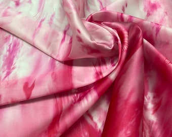 100% silk satin face organza, also called silk Gazzar 54” wide. Beautiful painting style Ombre design border style ivory pink Fusia.