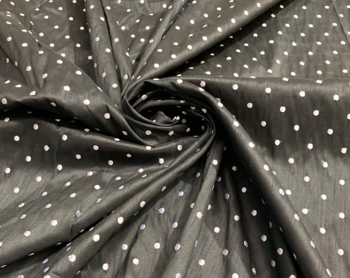 Shantung embaroidery 54" wide   Beautiful black shantung with white polka dots embroidered sokd by the yard