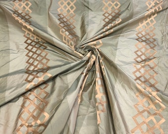 Silk taffeta 54" wide    Beautiful sage green with gold jaquard silk taffeta fabric sold by the yard